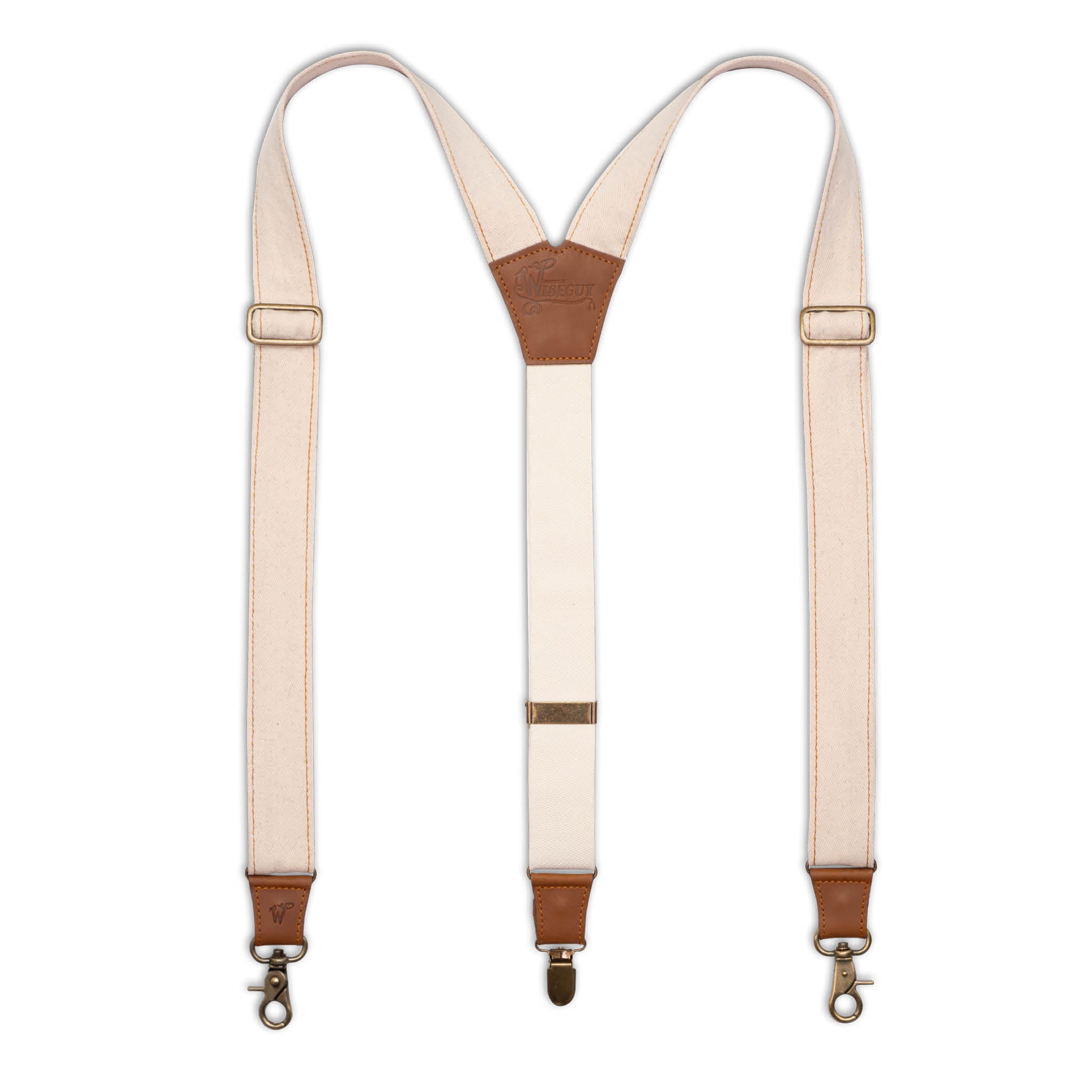 Flat lay of Ivory White Wiseguy Duck Suspenders with Camel Brown Authentic Nubuck Leather parts, Cotton Duck Canvas Straps, Brass metal hardware and Y-back design.